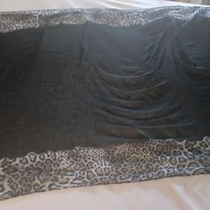 Calvin Klein black and gray leopard print scarve.